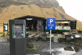 Gljufrabui and Seljalandsfoss parking and giftshop on a rainy day.
