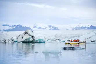 A boat tour among icebergs on Jökulsárlón Glacier Lagoon in Iceland.
