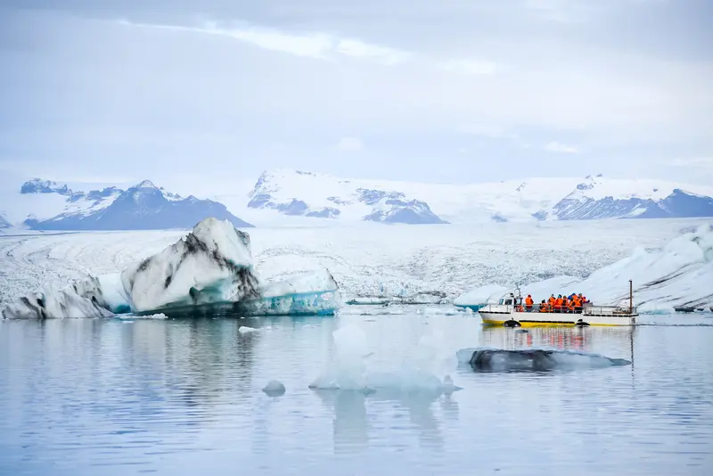 A boat tour among icebergs on Jökulsárlón Glacier Lagoon in Iceland.
