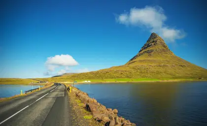 Kirkjufell mountain in Iceland, a popular landmark on the Snæfellsnes Peninsula, offering scenic views and a key point for navigation while traveling.