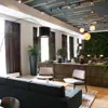Fosshotel Reykjavik modern lobby area with warm natural elements and comfortable sofas and seating areas.