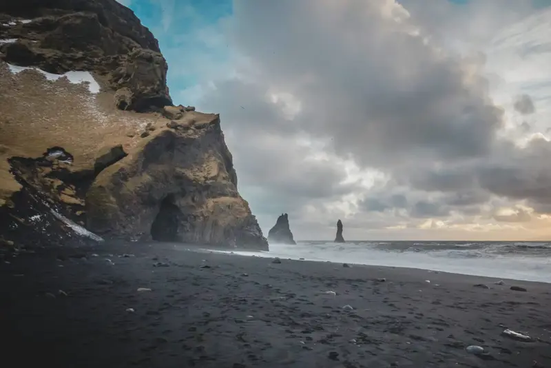 Cave Sea Stacks Black Sand Reynisfjara Iceland.