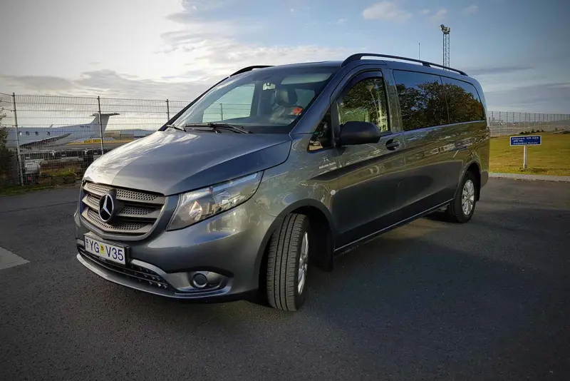A Mercedes van providing airport shuttle services in Reykjavik, Iceland.