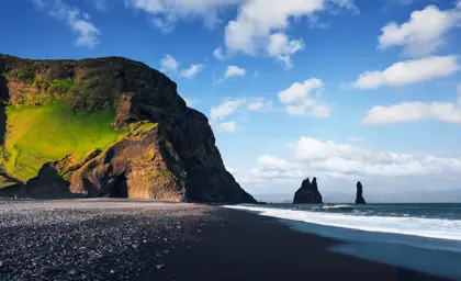 Reynisfjara black sand beach on a stopover day tour in Iceland.