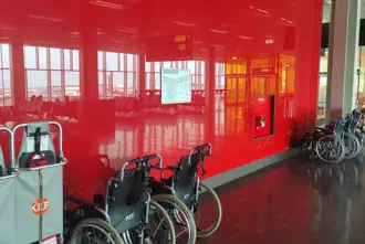 Wheelchairs and service for accessibility at Keflavik Airport in Iceland.