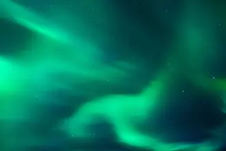 Iceland's Golden Circle view of Northern Lights Aurora in green.