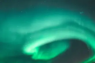 Spiral And Swirl Form Of Northern Lights In Iceland