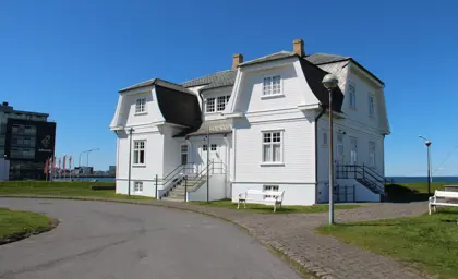 Höfði House in Reykjavík Iceland, where President Ronald Reagan and Soviet leader Mikhail Gorbachev met, with ocean views in the background.