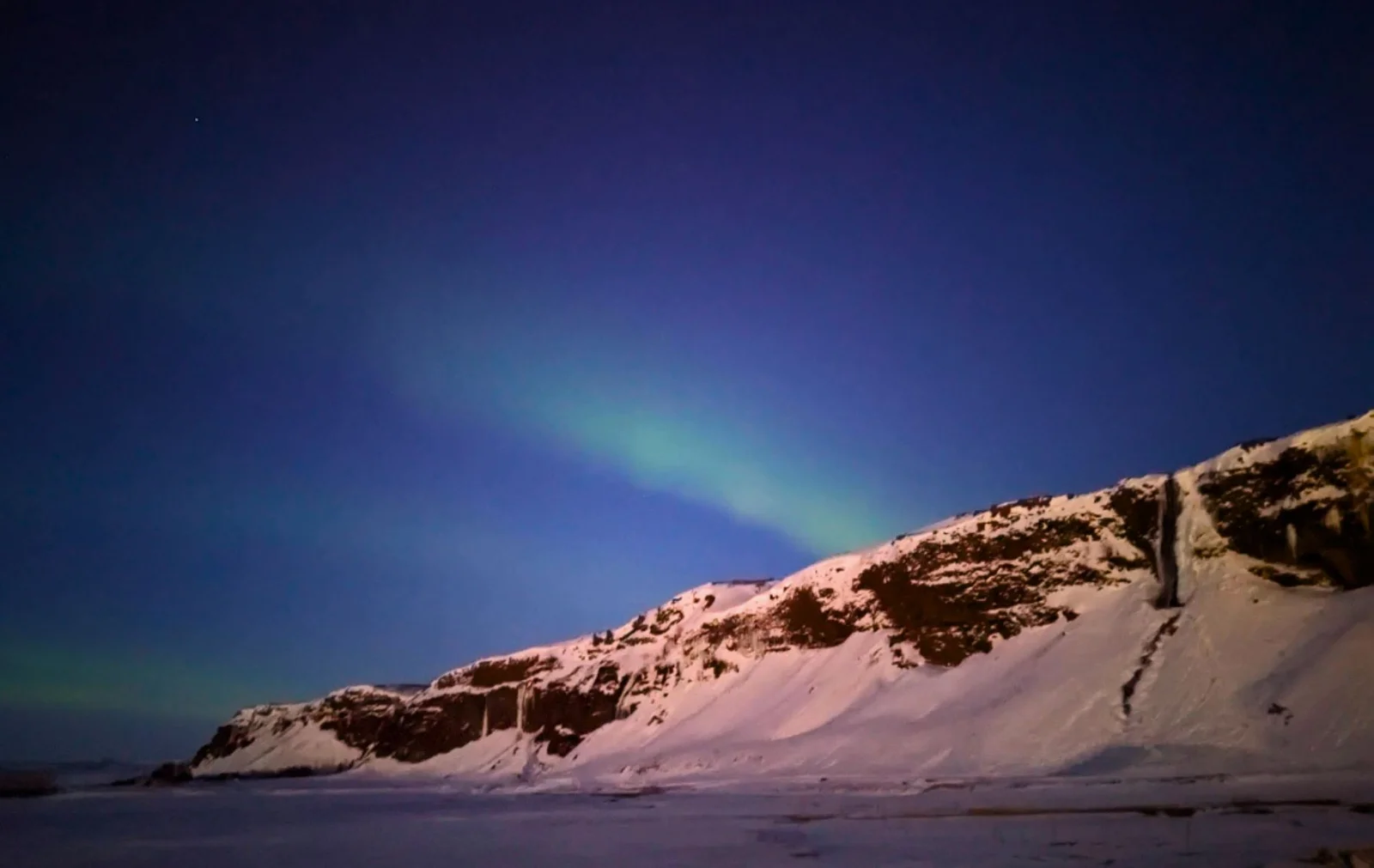 Northern Lights Seen From Seljalandsfoss Waterfall.