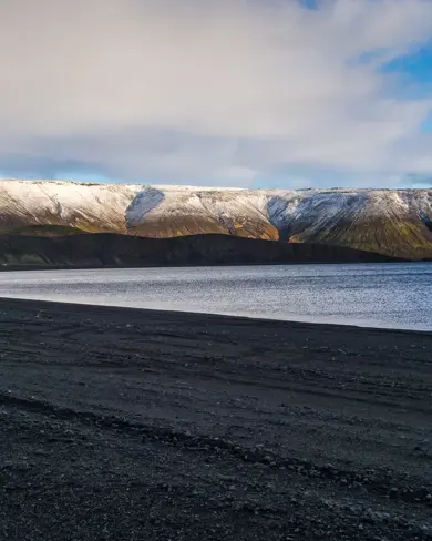 Lake Kleifarvatn with mountains in the far back.