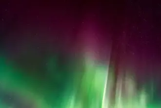 Deep Pink Northern Lights Aurora in Iceland.