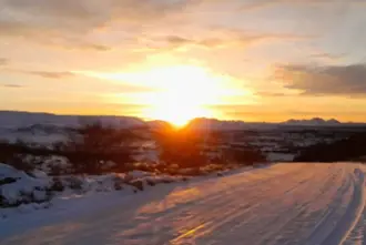 Heidmork in winter with bright sunset in Reykjavik Iceland.
