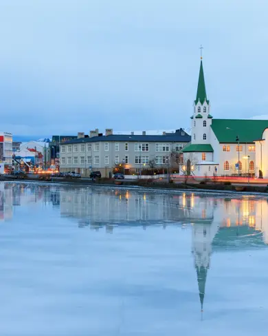 Reflection Reykjavik Free Church Tjornin Winter Blue Hour Travelreykjavik.Jpg Medium
