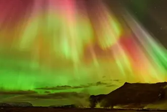 Colorful Northern Lights View Over Geothermal Area in Iceland.