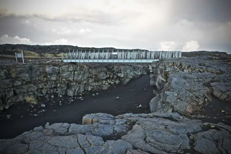 Bridge Between Two Continents in Iceland, crossing the Eurasian and North American tectonic plates.