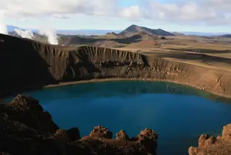 Krafla Volcano and Víti Crater with blue water.