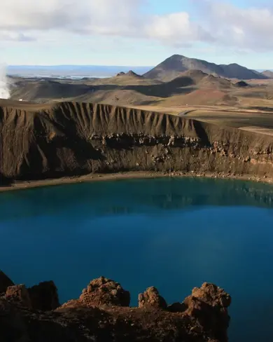 Krafla Volcano and Víti Crater with blue water.
